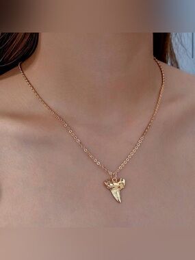 Glossy Gold Shark Tooth Pendant Necklace